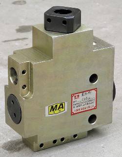 ��M���y